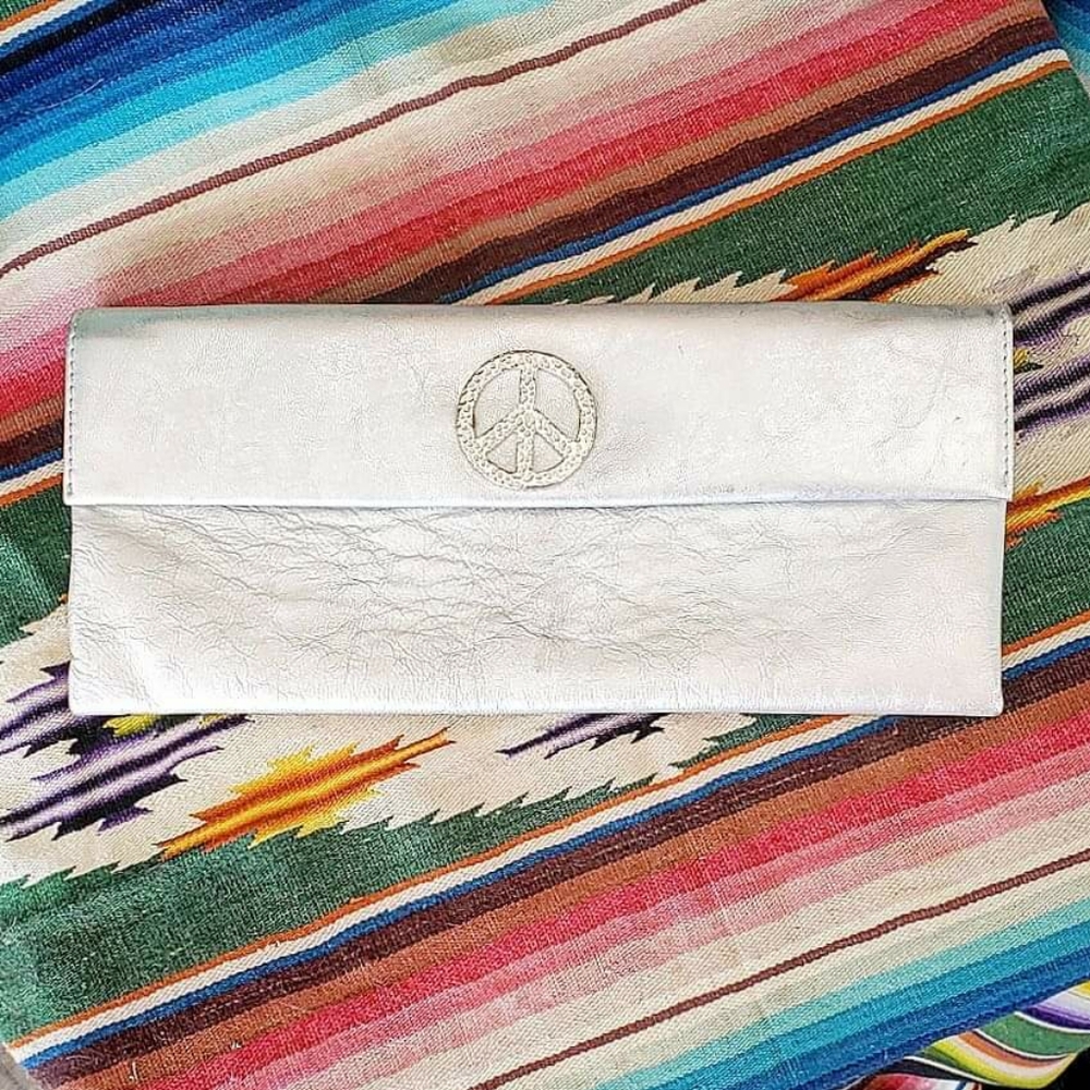 Donald J Pliner silver leather clutch